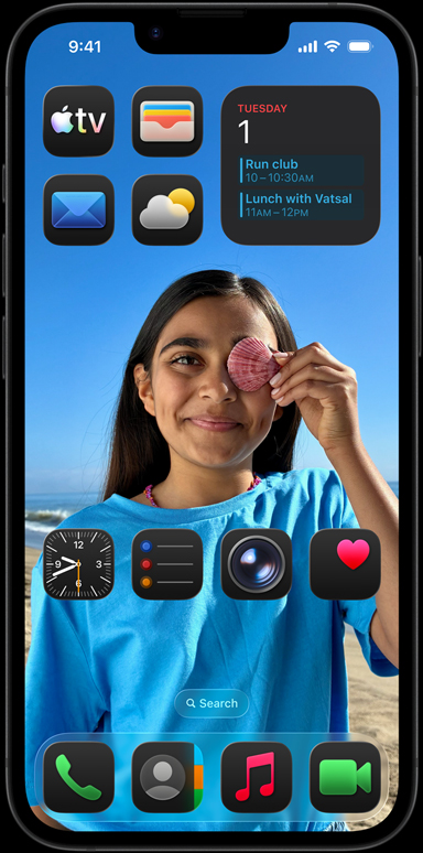 iPhone 16e surrounded by apps like Apple mail, WhatsApp, Safari, Apple maps, Apple Music, photos, notes and home