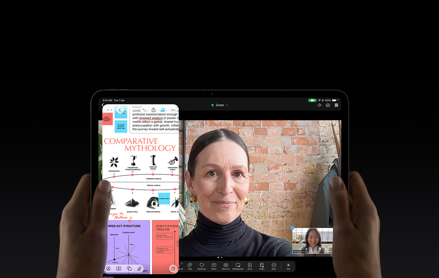 iPad Pro, front exterior, space black color, display showing a full-screen Zoom conversation, and an educational app with a presentation of "Comparative Mythology" with text, diagrams, and handwritten notes