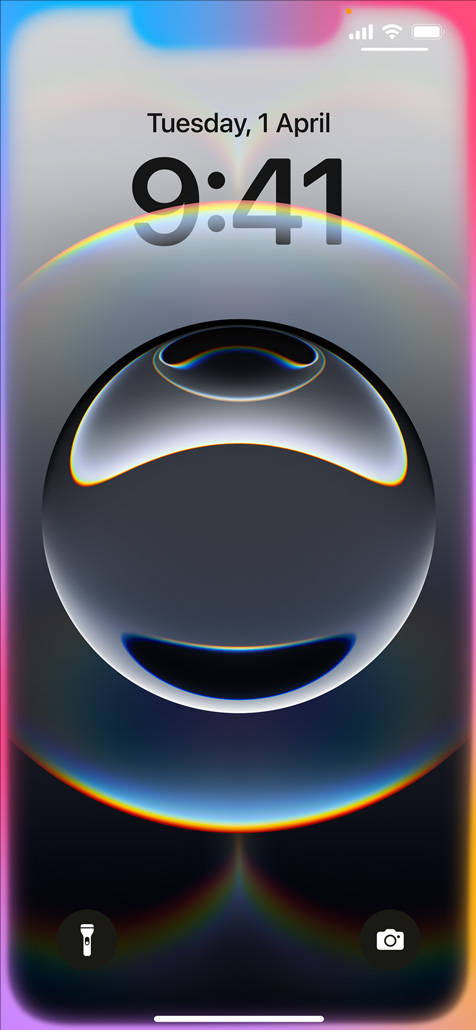 Hand holding iPhone 16e with colourful glowing edges around the Lock Screen.