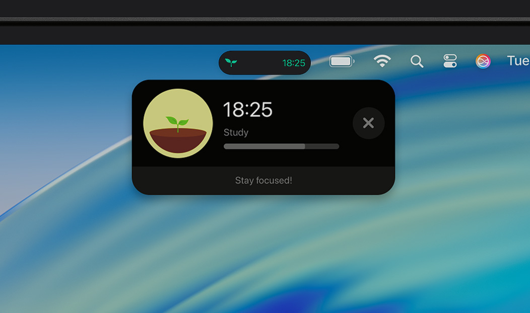 MacBook Pro, Live Activity notification shows the Forest app