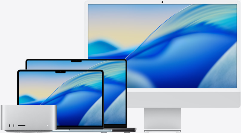 Bakgrunnen for macOS Tahoe vises på ulike Mac-modeller. Fra venstre til høyre: Mac Studio, 13-tommers MacBook Air i himmelblå, 14-tommers MacBook Pro i stellarsvart og 24-tommers iMac i sølv.