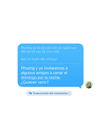 Live Translation in Messages with the user’s text message “Adriana and I will invite some friends to dinner on Sunday night. Do you want to come?“ automatically translated into Spanish